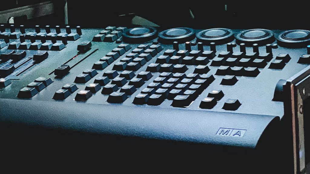 lighting console and keyboard full of buttons